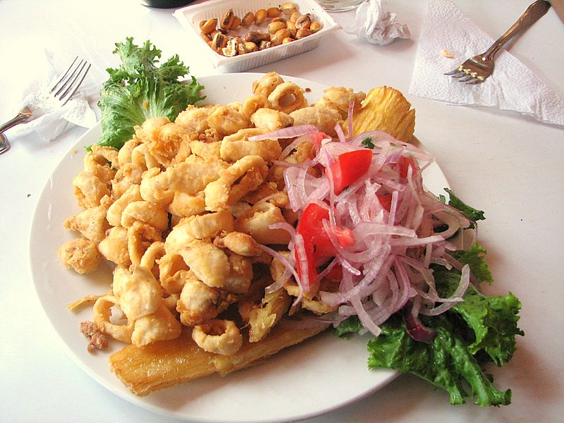 Peruvian fried fish chicharrón with salsa criolla